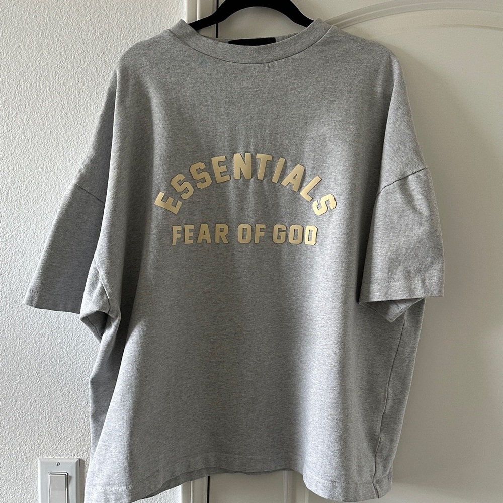 Fear of God Essentials Heather Gray Tee with Gold Print
